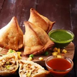 Golden vegetable samosas with mint and tamarind chutney